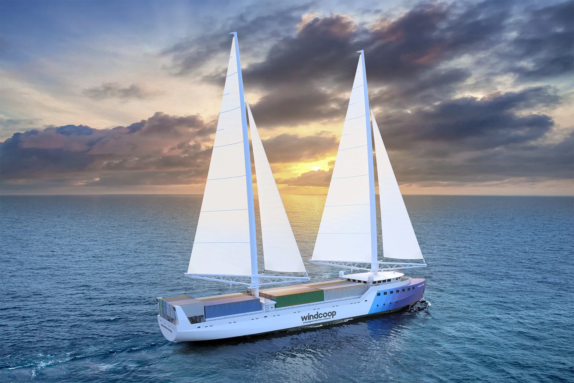Le voilier-cargo Windcoop sous voiles au coucher du soleil, vue d’artiste